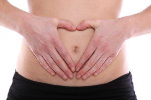 heart hand on stomach follow your gut iStock_000012036487Small