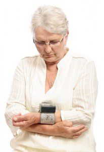 mature woman blood pressure checking dreamstime 19862767
