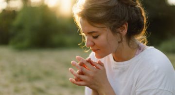 Bigstock woman closed her eyes praying 424720163 640